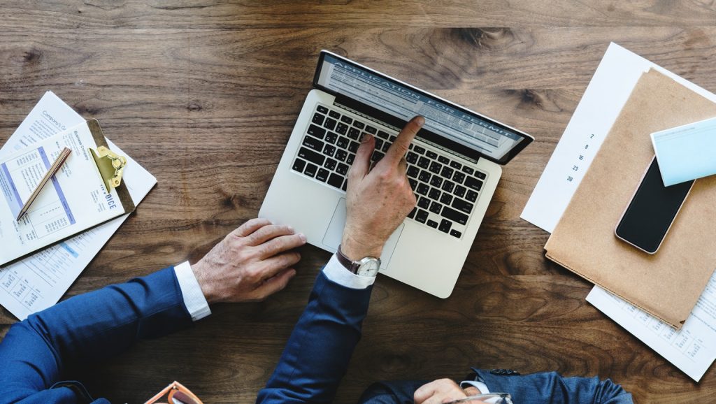 two people going over a qualified opinion audit service