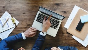 two people going over a qualified opinion audit service