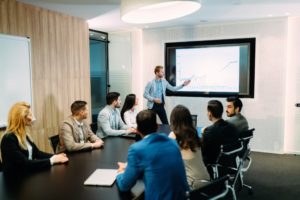 People in a conference room having a meeting